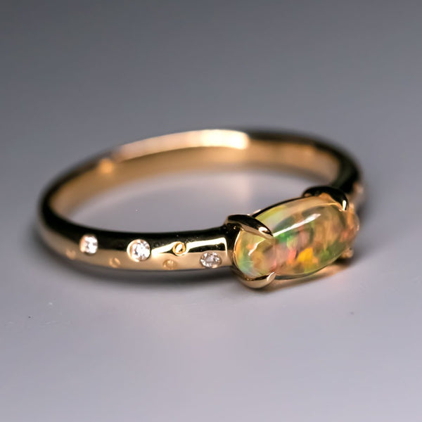Fire Opal Engagement Ring with Diamonds