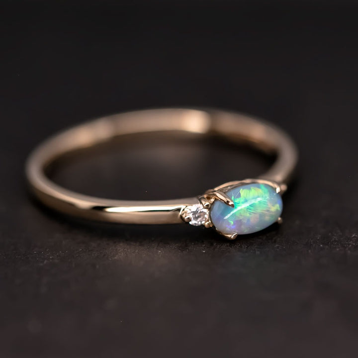 Classic Three Stones Black Opal Engagement Ring