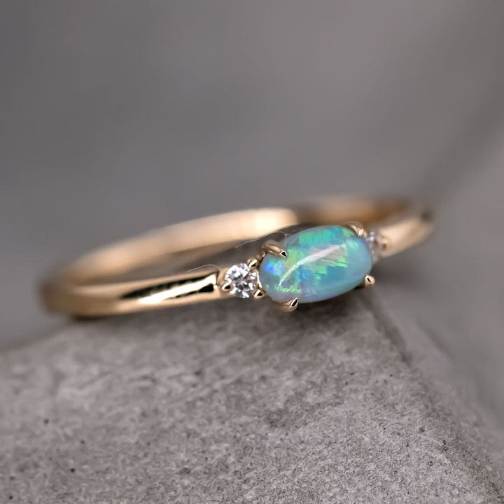 Classic Three Stones Black Opal Engagement Ring