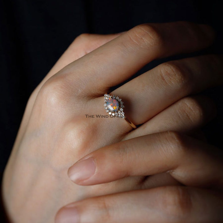 Black Opal and Diamond Halo Engagement Ring