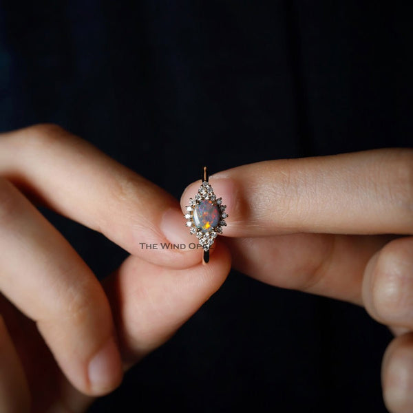 Black Opal and Diamond Halo Engagement Ring