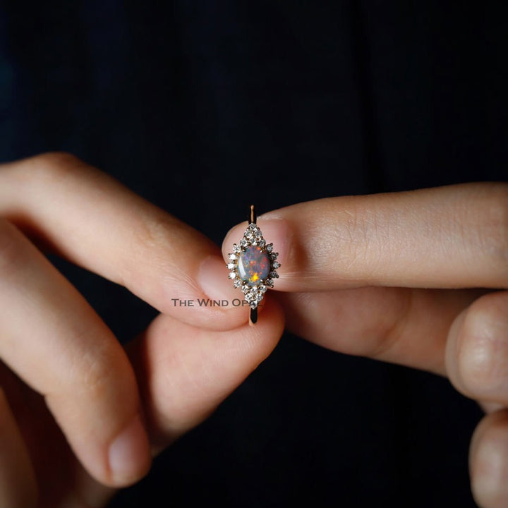 Black Opal and Diamond Halo Engagement Ring