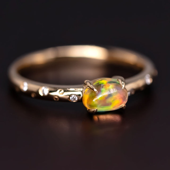Exquisite Engagement Ring with Fire Opal Diamonds
