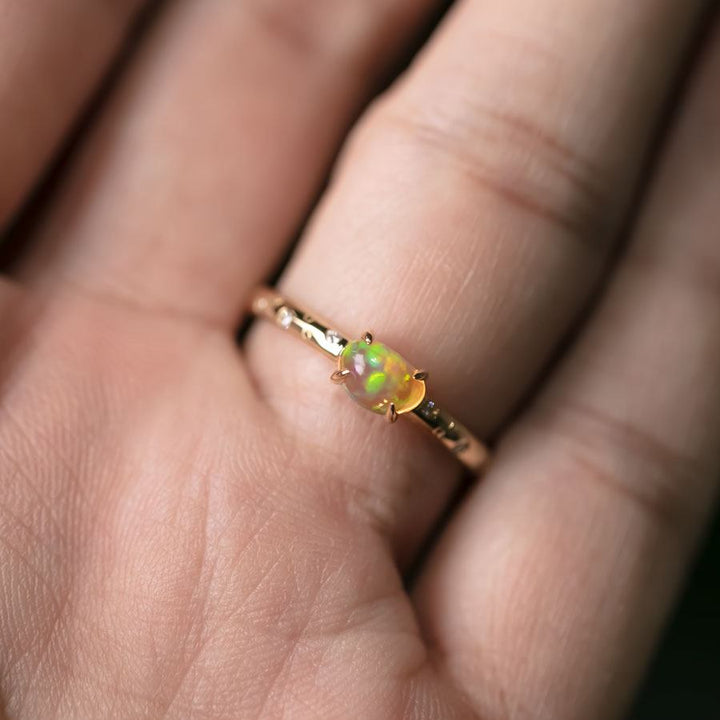 Exquisite Engagement Ring with Fire Opal Diamonds