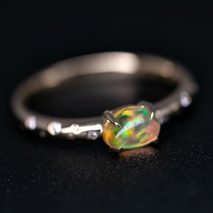 Exquisite Engagement Ring with Fire Opal Diamonds