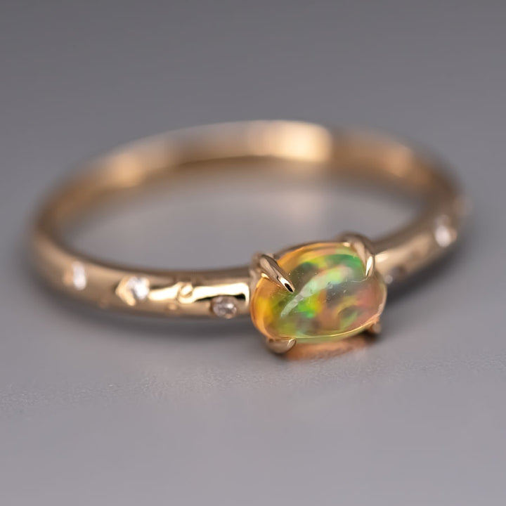 Exquisite Engagement Ring with Fire Opal Diamonds