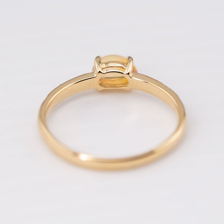 Exquisite Engagement Ring with Fire Opal Diamonds
