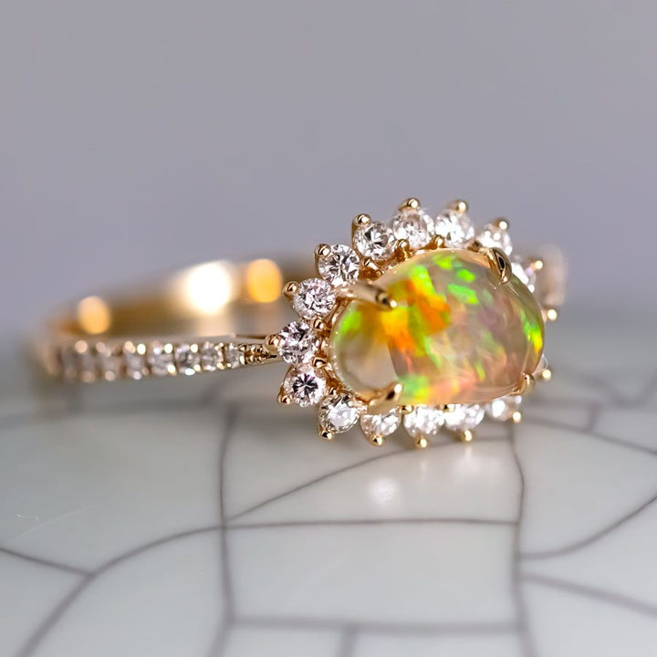 Exquisite Fire Opal Halo Diamond Engagement Ring