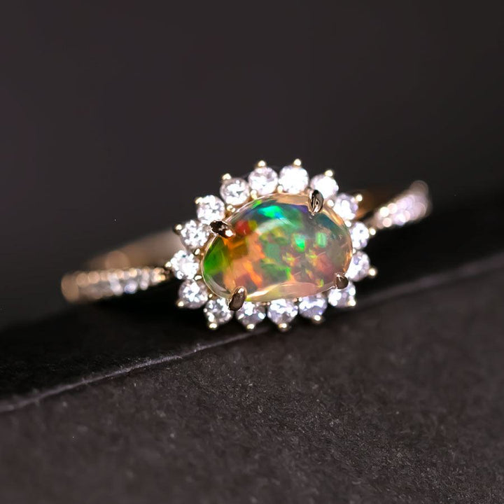 Exquisite Fire Opal Halo Diamond Engagement Ring