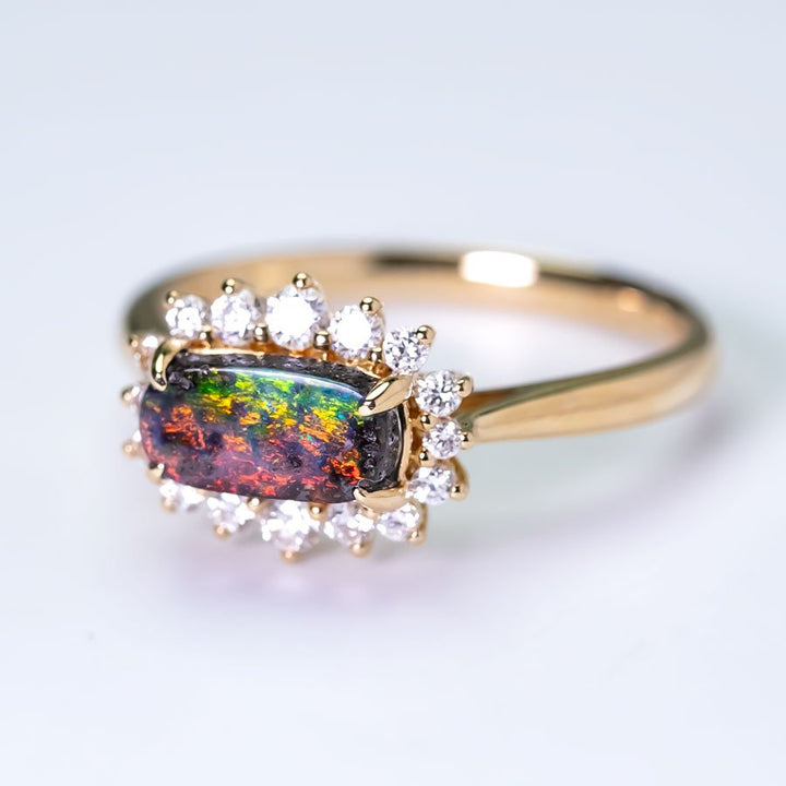 Magnificent Boulder Opal Halo Diamond Engagement Ring