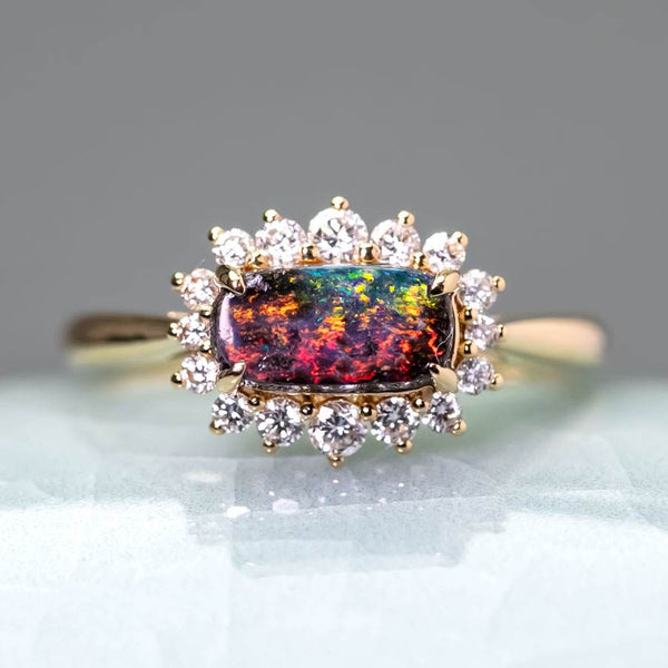 Magnificent Boulder Opal Halo Diamond Engagement Ring
