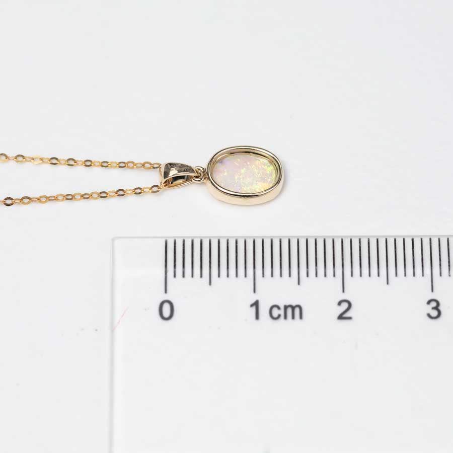 The Wind Opal Minimal Oval Australian Solid Opal Pendant – 18k Yellow Gold – Natural Blue/White Precious Opal – 0.44ct – Charm Only