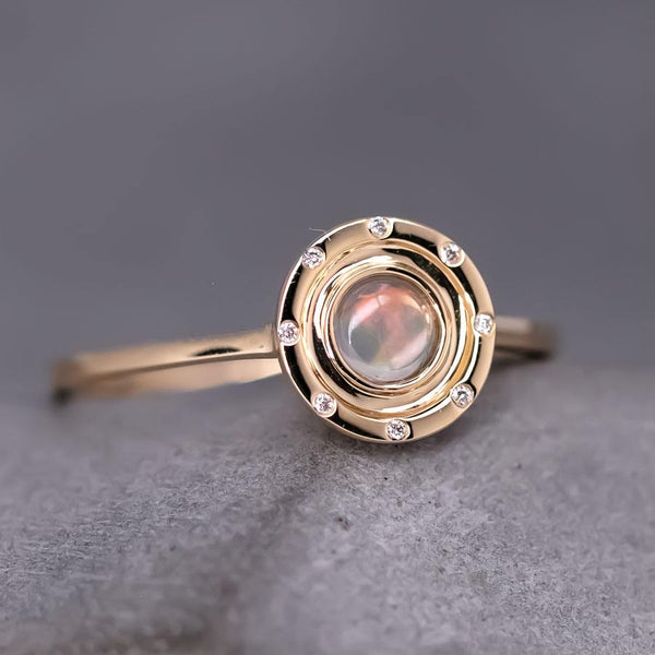 Radiant Halo Fire Opal Ring with Diamond Accents