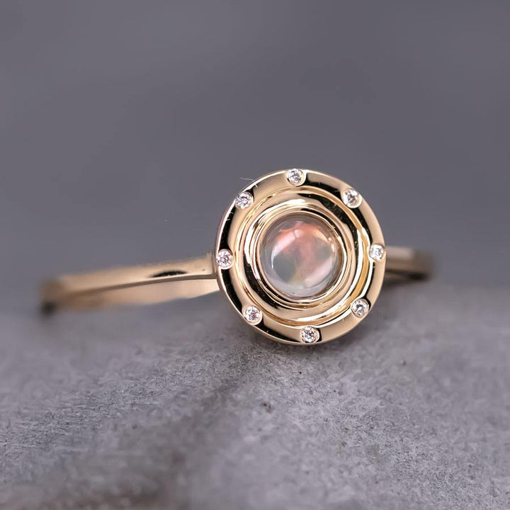 Radiant Halo Fire Opal Ring with Diamond Accents