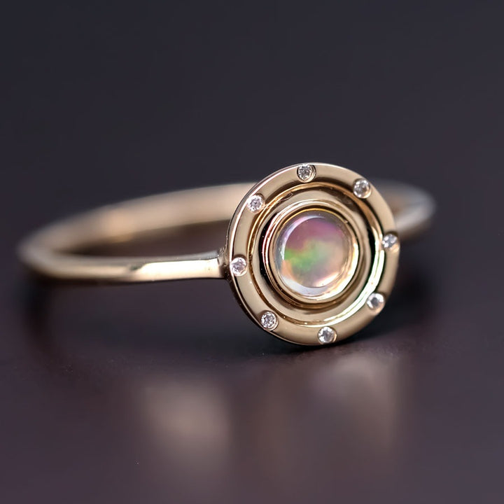 Radiant Halo Fire Opal Ring with Diamond Accents