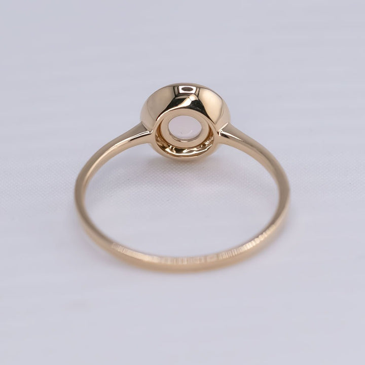 Radiant Halo Fire Opal Ring with Diamond Accents