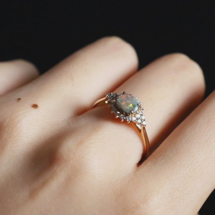 Black Opal and Diamond Halo Engagement Ring